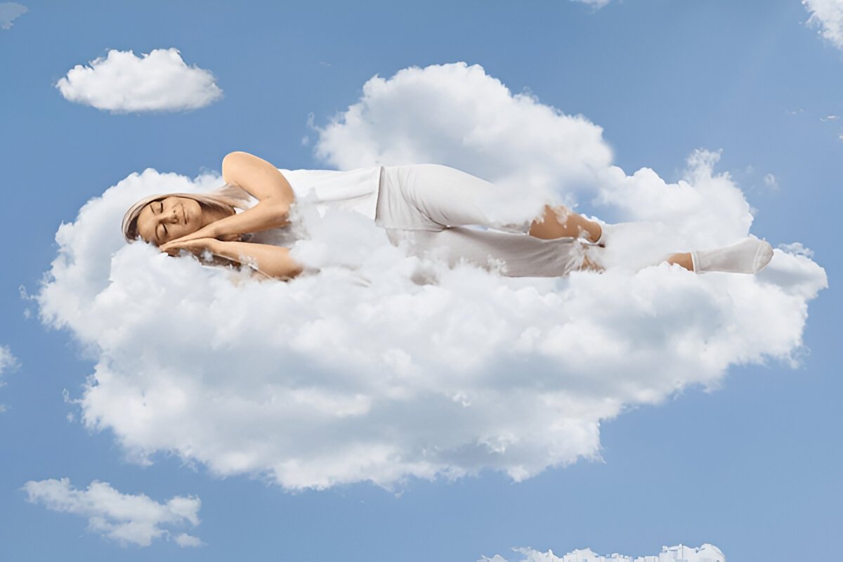 A woman in a deep sleep rests on a soft cloud, surrounded by a calm, dreamy sky, symbolizing serenity and comfort