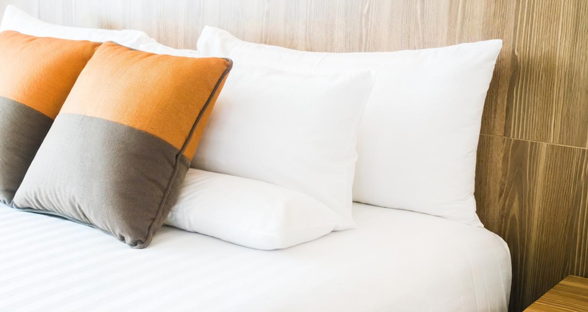 Pillows assorted on a bed