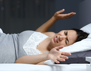 A woman distressed and enable to sleep