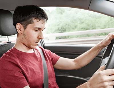A man experiencing a sleep attack while driving