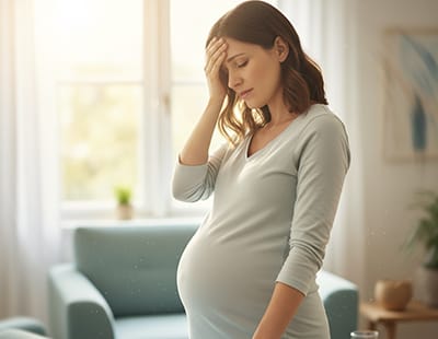 A pregnant woman feels dizzy and distressed