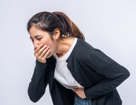 A woman suffering from nausea.