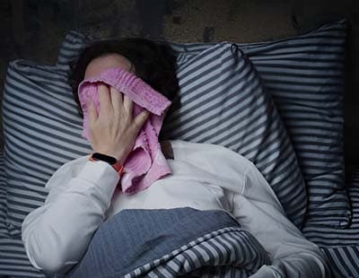A Woman Facing Disruption in Sleeping Due to Night Sweat