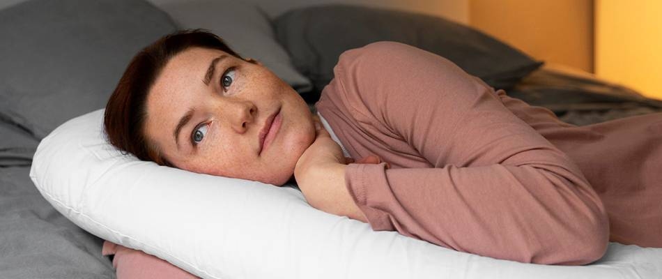 A middle-aged woman seems to be distressed.