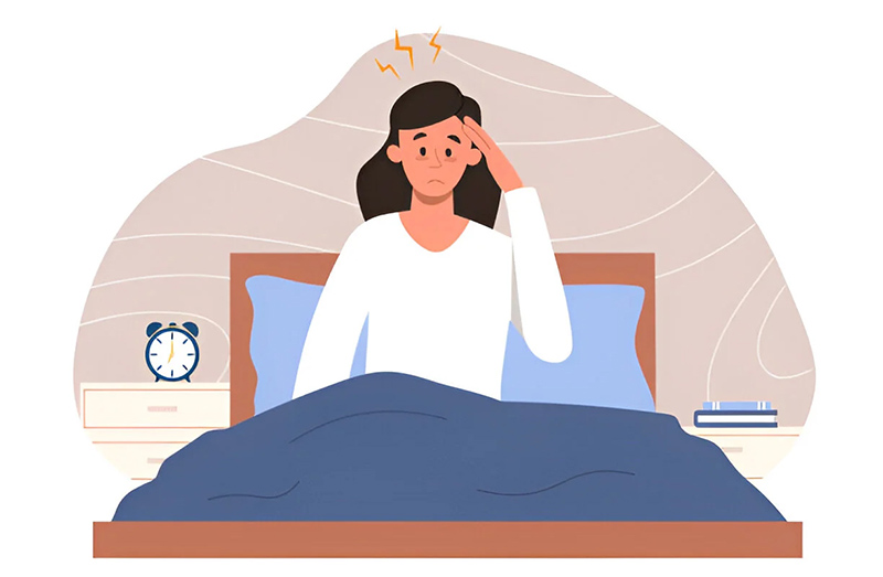 A Woman Experiencing Headache Due to improper sleep schedule